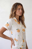 Baumwoll-Schlafanzug Orangen Damen, atmungsaktive Baumwolle, Baumwoll-Pyjama für Damen zum Einkuscheln, Vorderansicht