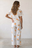 Baumwoll-Schlafanzug Orangen Damen, atmungsaktive Baumwolle, Baumwoll-Pyjama für Damen, Detailansicht der Verarbeitung