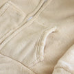 Fleece-Schlafanzug Hasenohren Creme, flauschiges Fleece, Fleece-Pyjama für Damen, Detailansicht der Verarbeitung